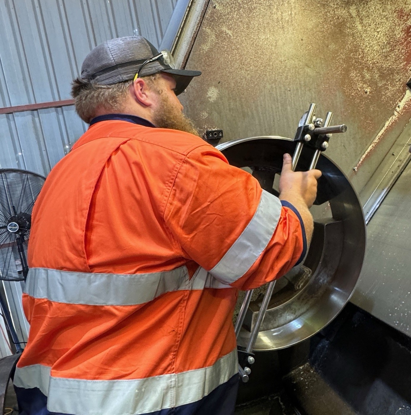 Allegiant team member gauging a manufactured casing component