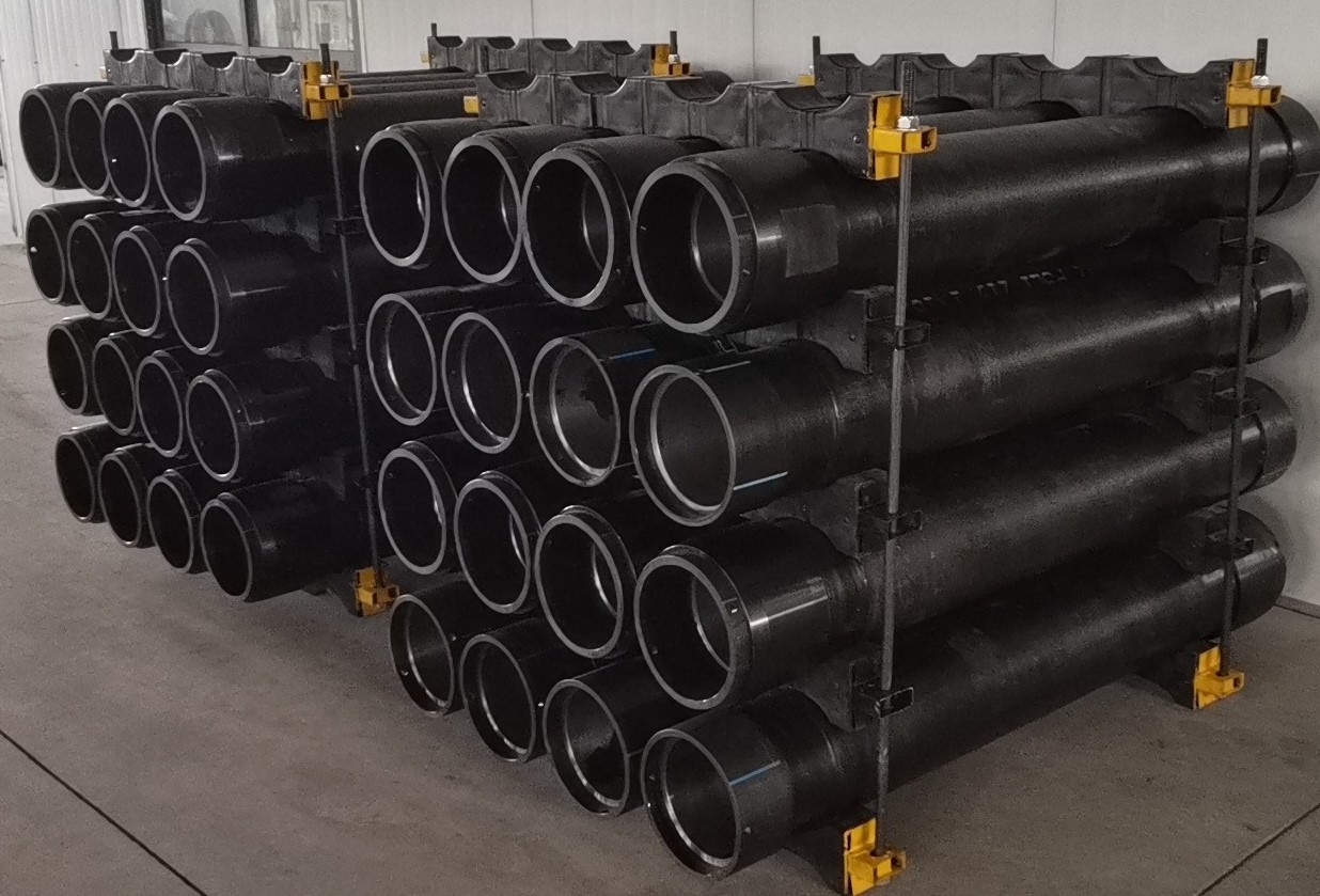 AIC threaded casing pipes stacked in storage racking