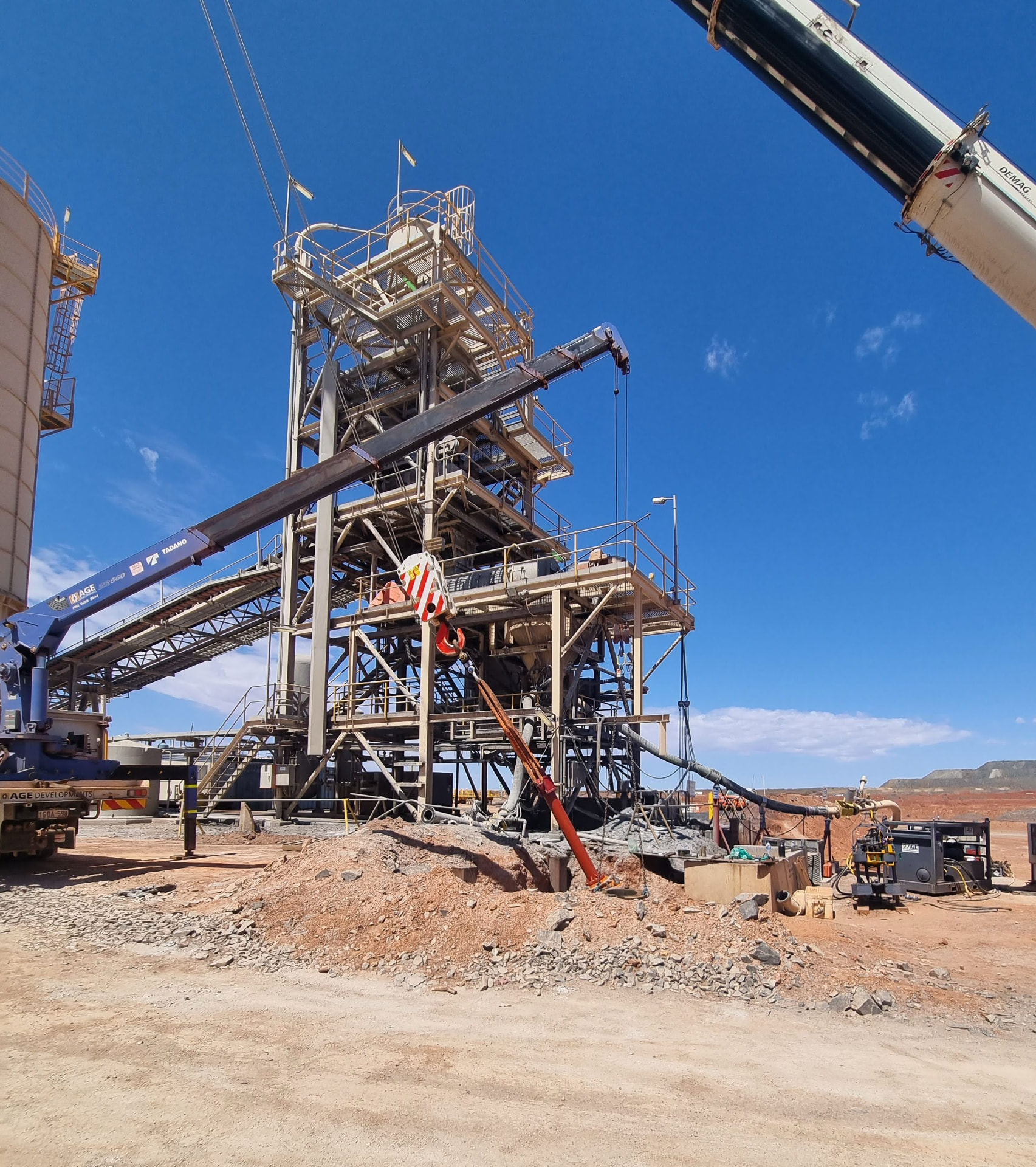 Crane lifting casing into place at a mine site paste plant